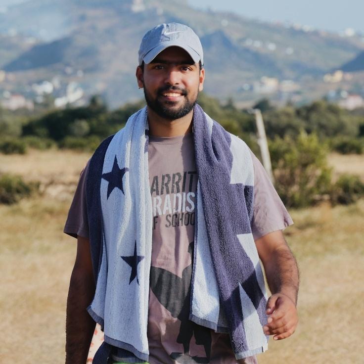 Kaveri Mehta, Lead Design Curator at Vector Path Timely, reviewing corporate floral arrangements